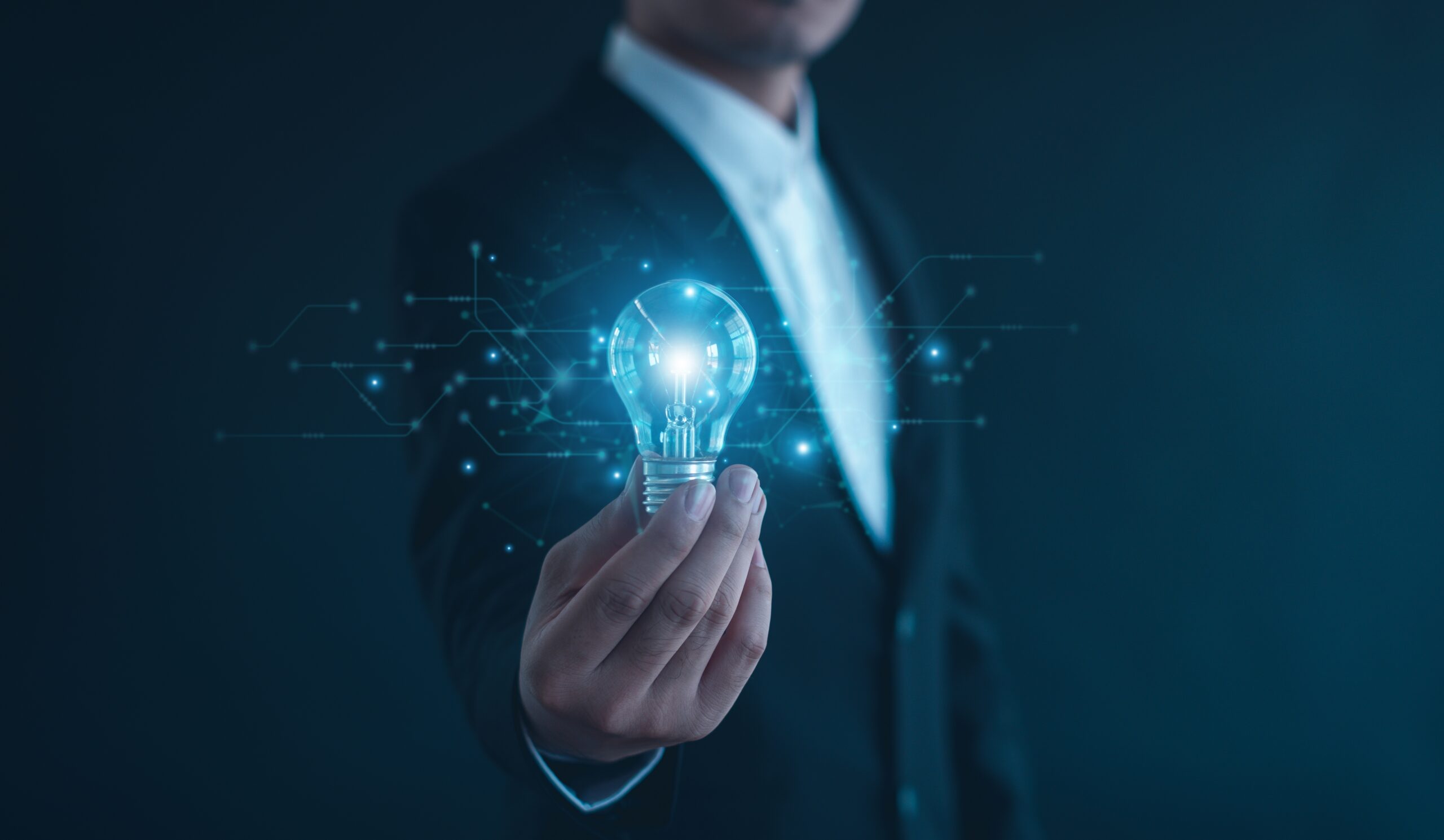 Idea,Innovation,And,Inspiration,Concept.hand,Of,Man,Holding,Illuminated,Light Idea,Innovation,And,Inspiration,Concept.hand,Of,Man,Holding,Illuminated,Light